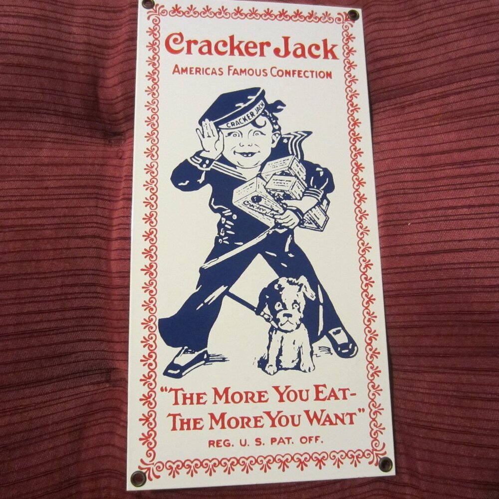 ANDE ROONEY'S PORCELAIN ENAMELED ADVERTISING SIGN/CRACKER JACK/SIGN